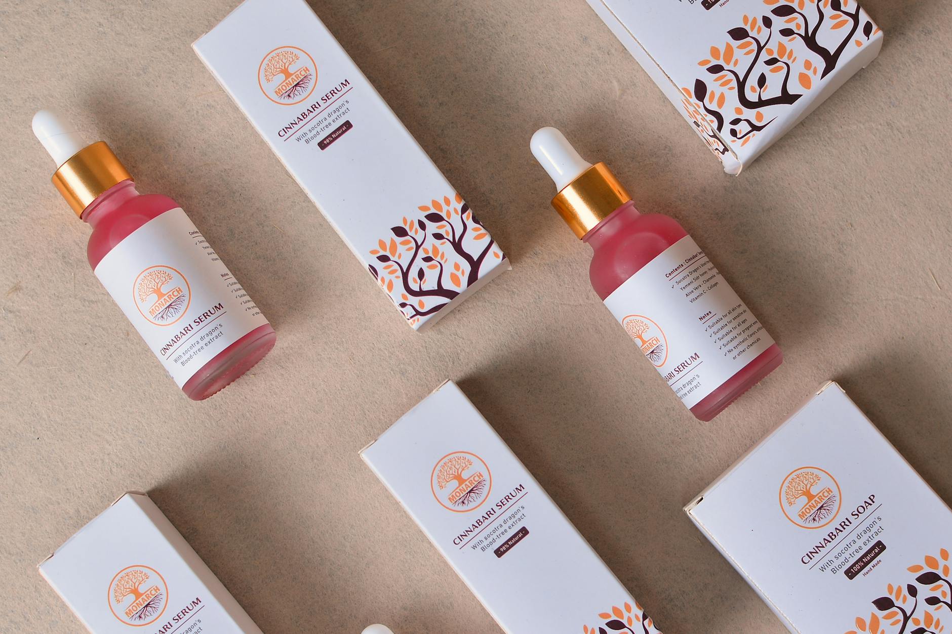 Flat lay of cosmetic serum bottles and boxes for beauty and skincare