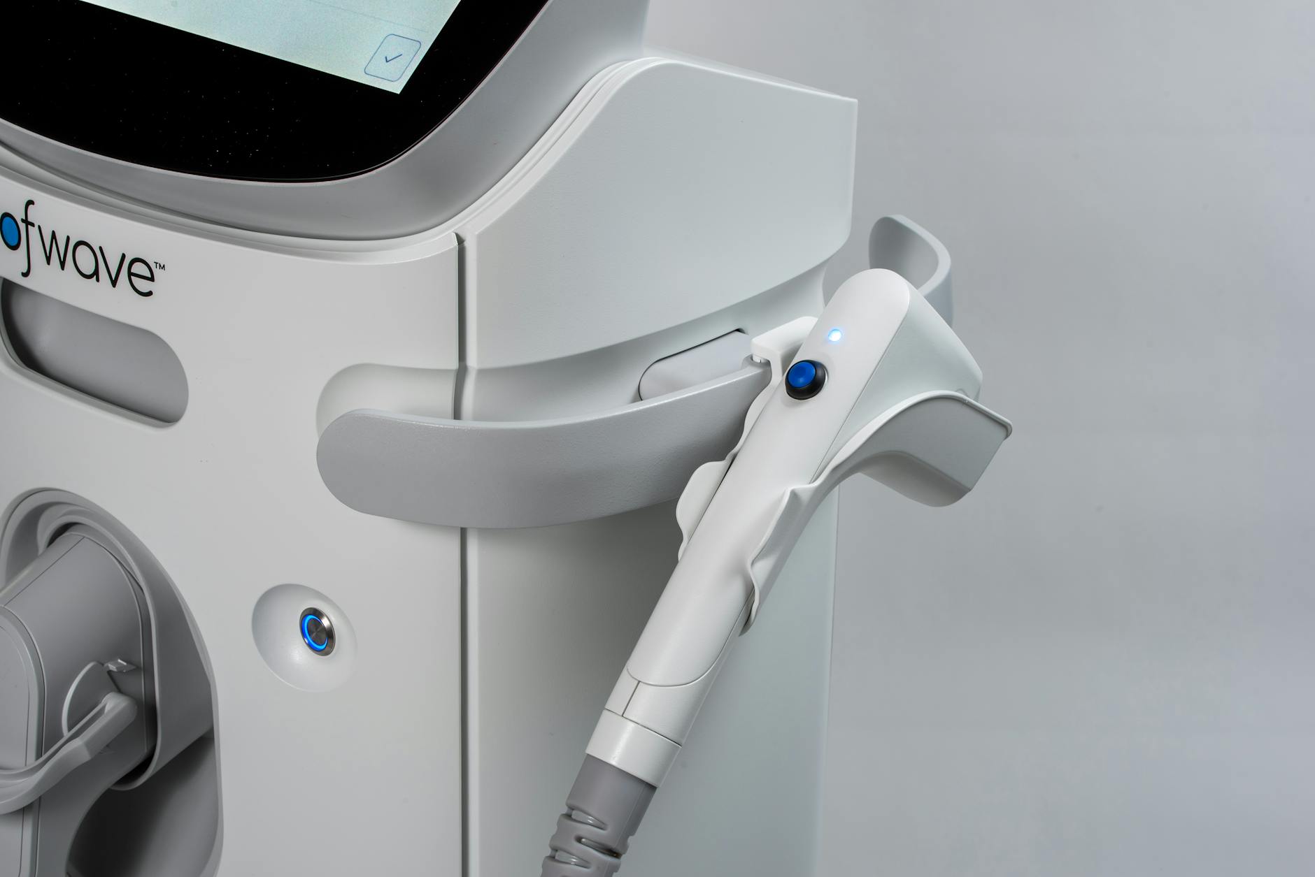 Close-up of an ultrasound device handpiece used in non-surgical skin tightening treatments